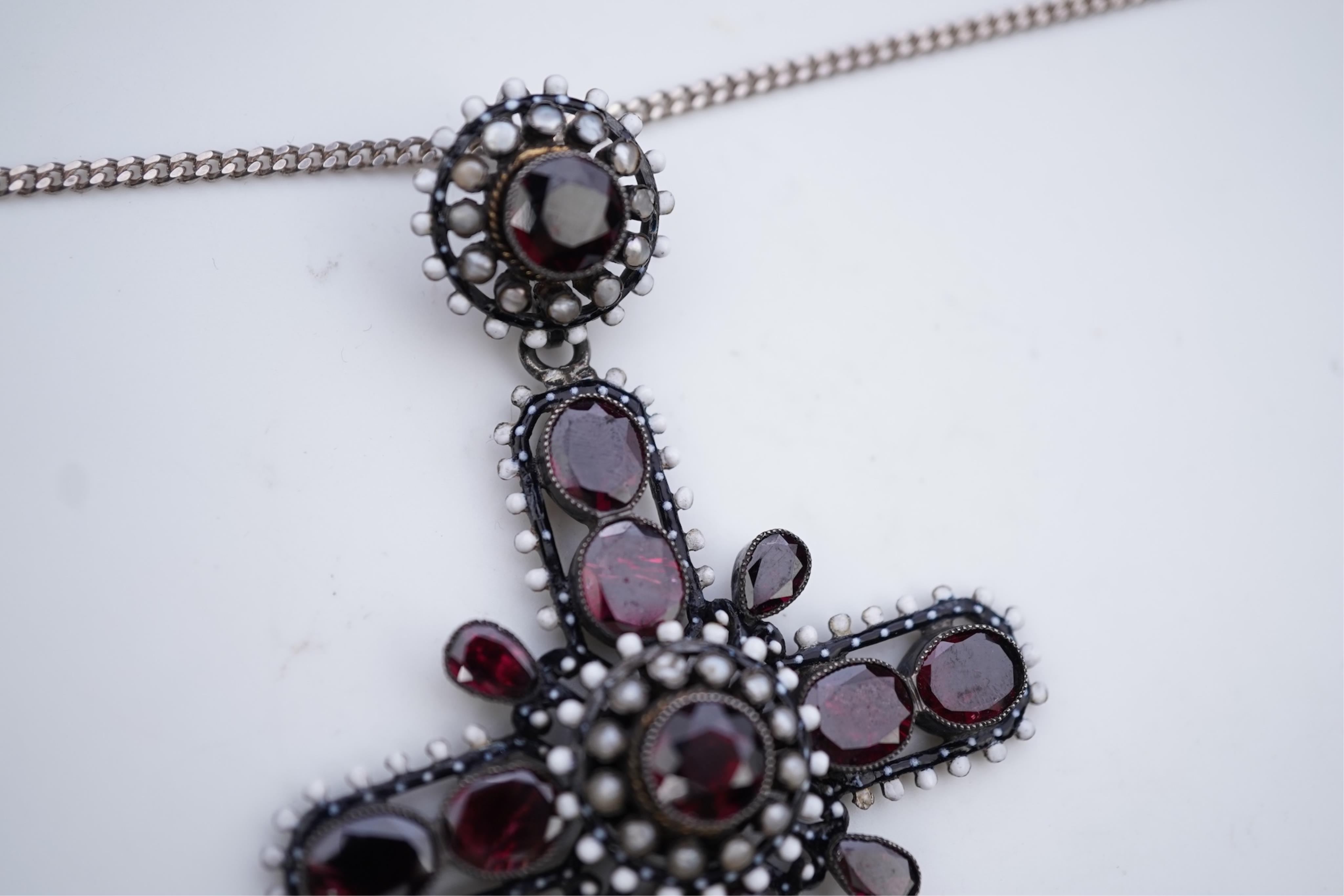A Renaissance Revival enamel and garnet pendant, late 19th century